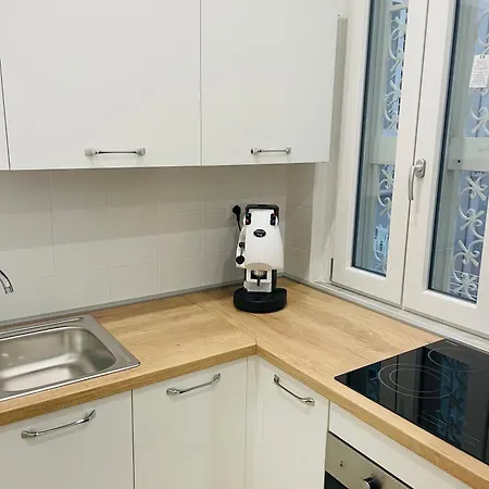Ai Piedi Del Campanile *